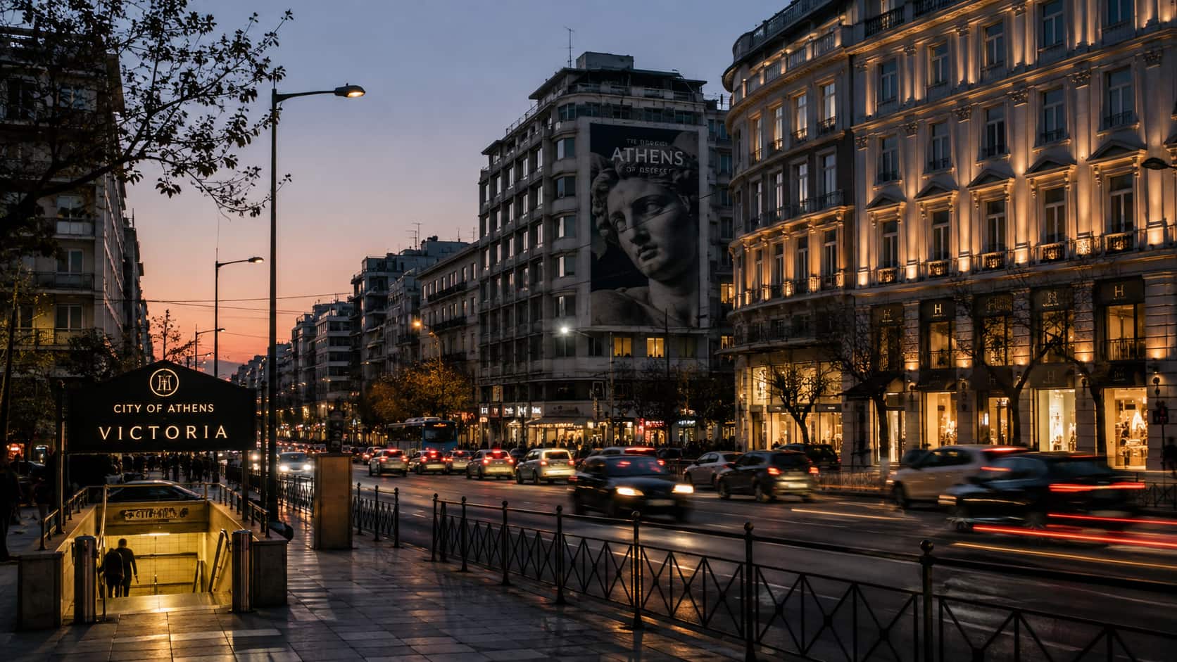Victoria metro entrance on a lit Athens street at dusk
